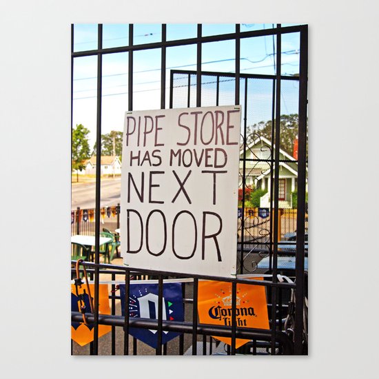 Pipe store next door Canvas Print