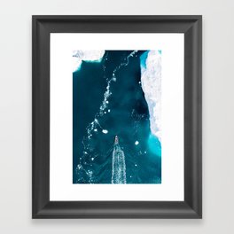 Boat surrounded by Icebergs Framed Art Print
