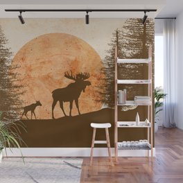 Mother moose and her cub in the mountains at sunset Wall Mural